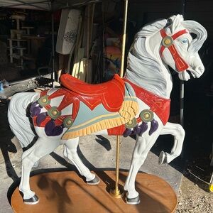 Dynamic Red and Purple Carousel Horse Sculpture